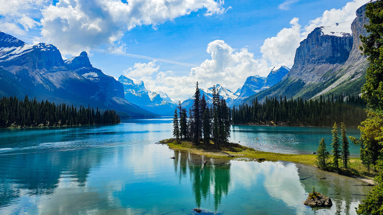 Spirit Island sits in the middle of Maligne Lake in Jasper National Park Canada