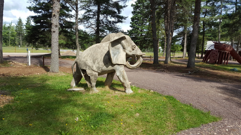 Elephant sculpture among the campground of Animaland Park in New Brunswick