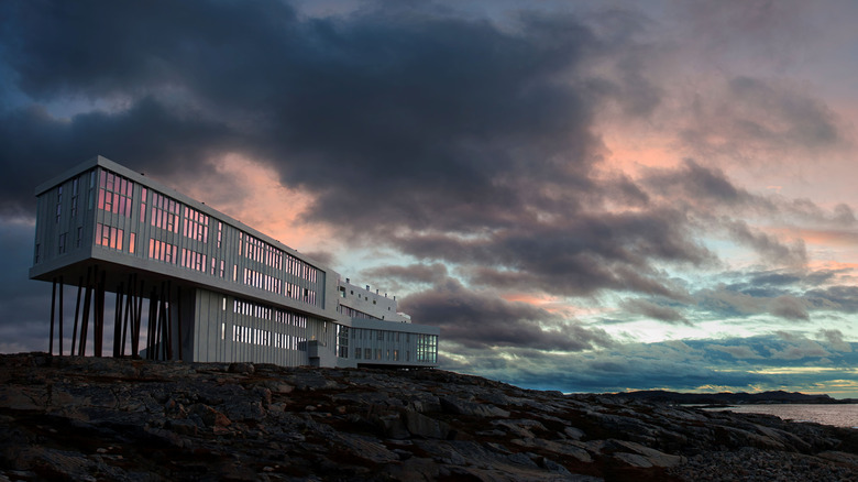 Exterior of Fogo Island Inn, a hotel in Newfoundland and Labrador in Canada, at sunset