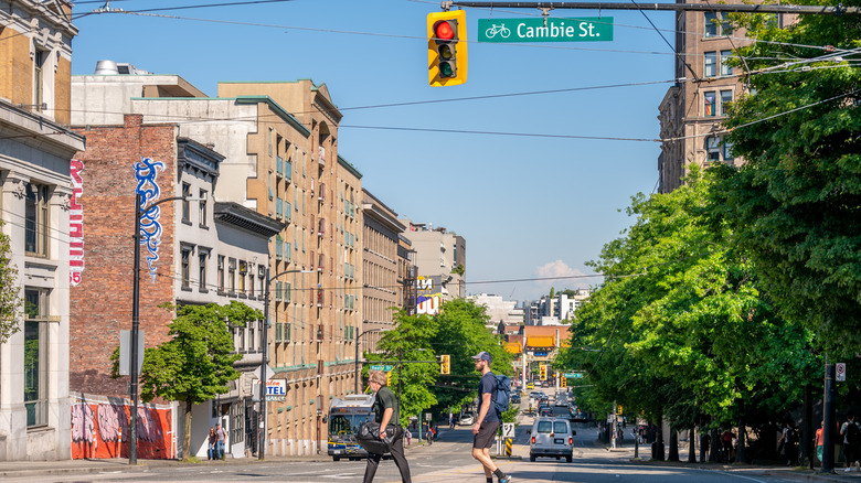Pedestrians crossing the road on Cambie Street in Vancouver