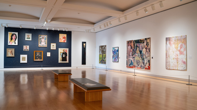 Interior at the Robert McLaughlin Gallery with paintings on the walls