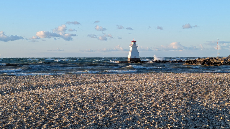 A lighthouse rises about Southampton Beach in Saugeen Shores, Ontario