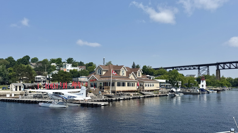 The Parry Sound Harbor with seaplanes and boats parked by docks in Ontario