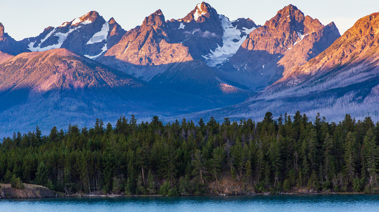 Chilko Lake in Ts'ilʔos Provincial Park, British Columbia, Canada, with mountain ranges in the background