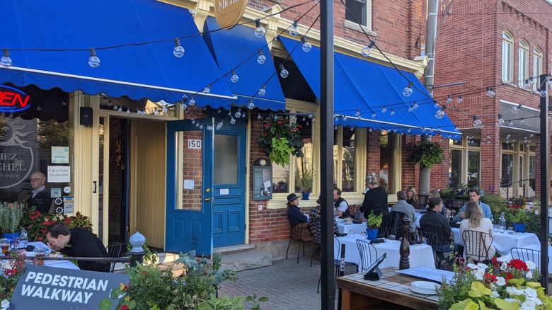 People sitting on a restaurant patio in Creemore, Ontario