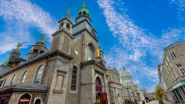 Shot from down low of historic church and city street in Old Montreal, Quebec