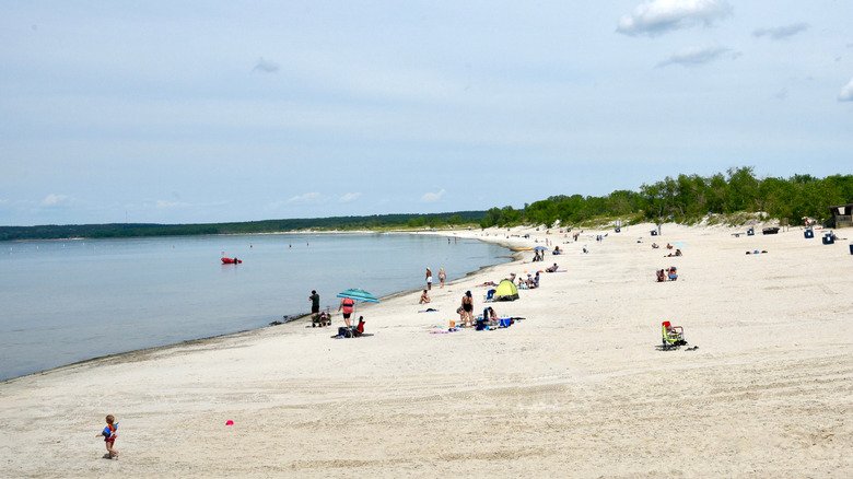 People enjoying a sunny day at Grand Beach, Manitoba, Canada