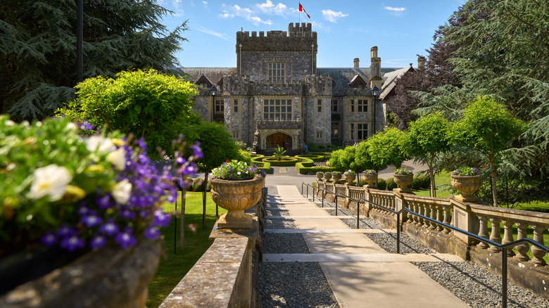 Hatley Castle viewed from a distance through its surrounding gardens