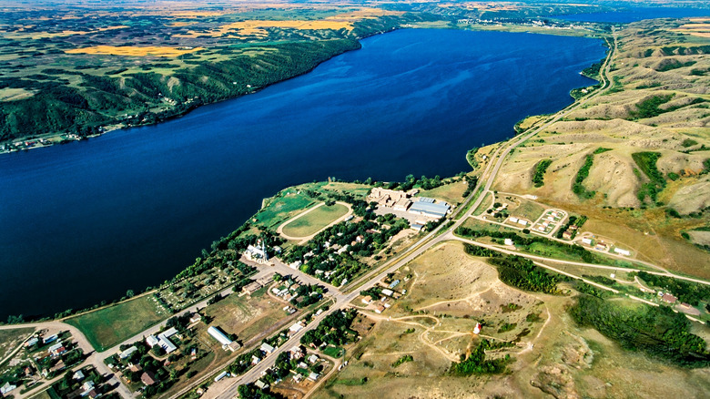 Aerial view of Mission Lake next to the village of Lebret and surrounded by hillsides.