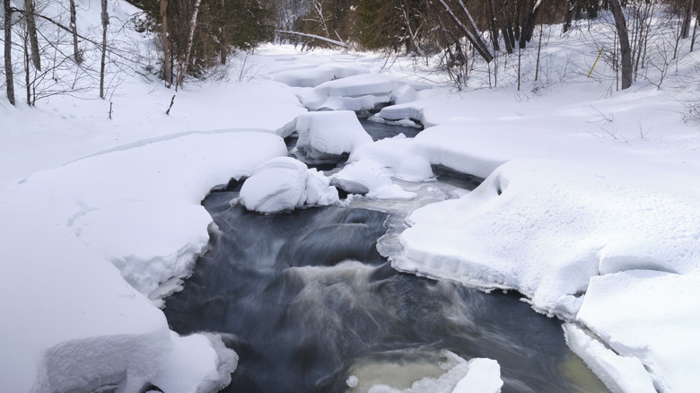 La Peche river through snow and ice