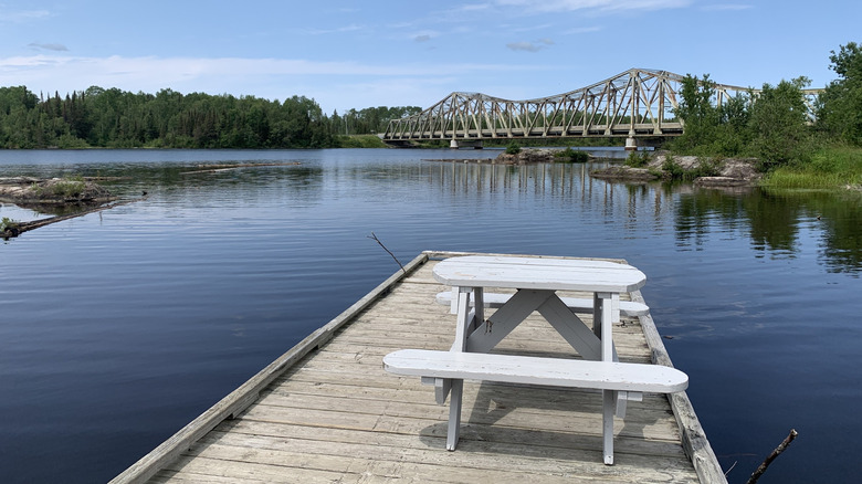 Dock and river view at Kelly Park in Smooth Rock Falls, Ontario, Canada