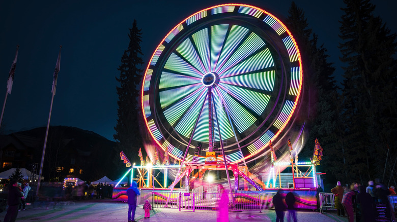 A ferris wheel at dusk at the Whistler Winter Festival, Whistler, British Columbia
