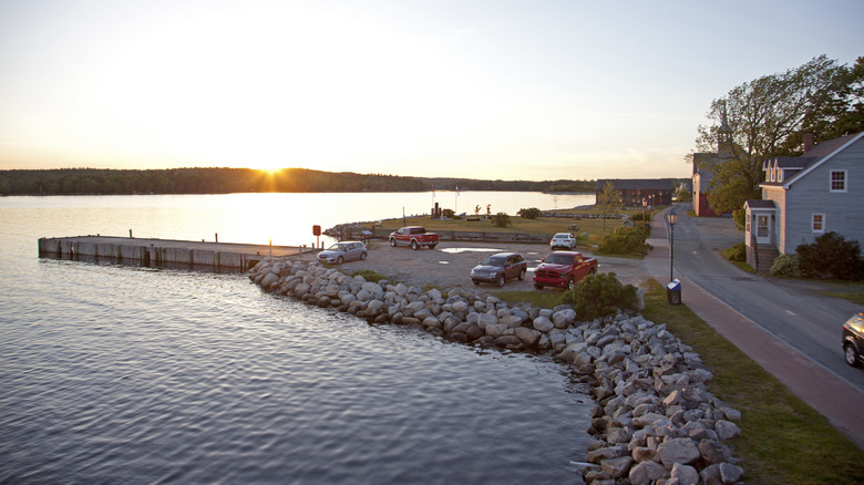 Pier and waterside road on Dock Street at sundown