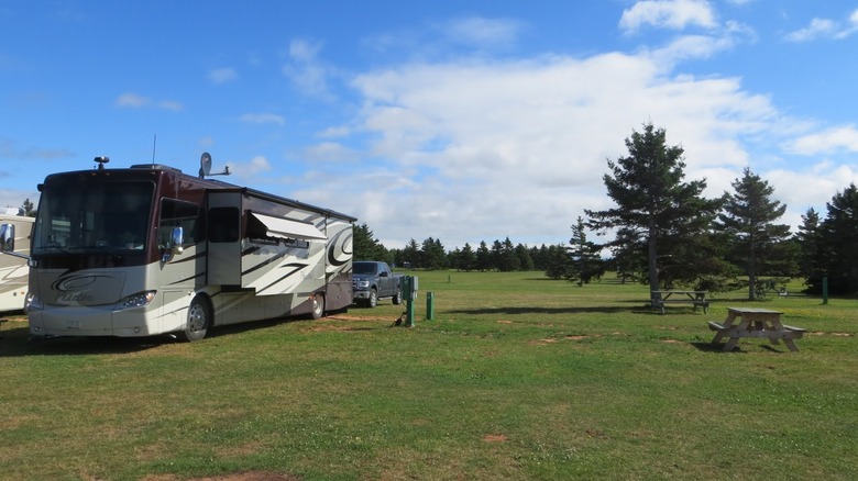 An RV parked at a campsite at Cabot Beach Provincial Park
