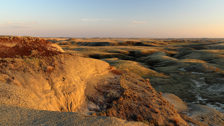 sunset over grasslands national park's badlands (east block) in canada
