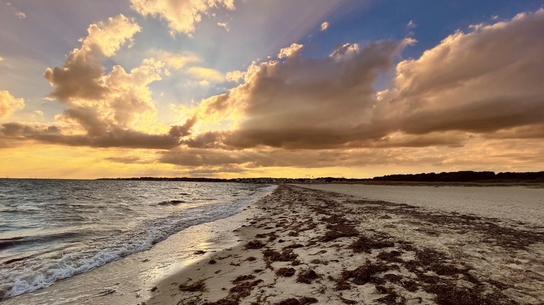 Beautiful orange sunset at Kalmus Beach
