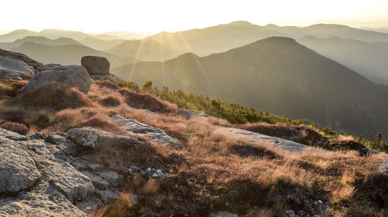 Sunrise from Mount Marcy shining down at Mount Haystack in New York State