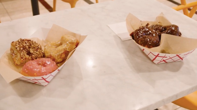 Donuts in baskets on table at Dutch Door Donuts, Carmel
