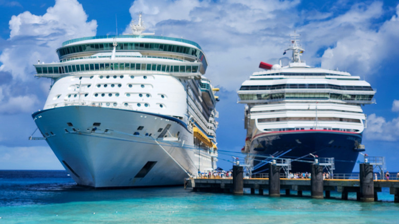 Royal Caribbean's Adventure of the Seas and Carnival's Sunrise docked next to each other at Grand Turk