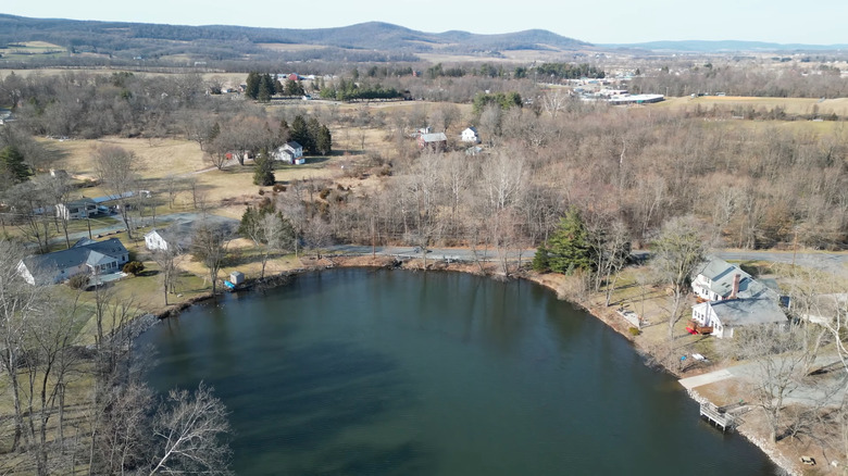 Lake with houses and trees surrounding it in Carroll Valley, PA