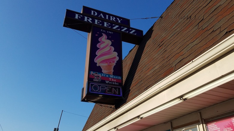 Dairy Freezzz vintage neon sign in Center Line, Michigan during the daytime