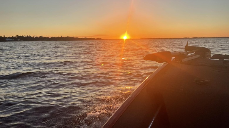 Boat and sunset on Lake Buffum, Florida