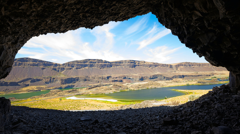 Cliffs and lakes from massive opening at Lake Lenore Caves