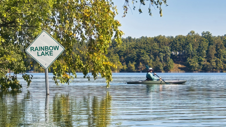 A person kayaking on Rainbow lake in Waupaca
