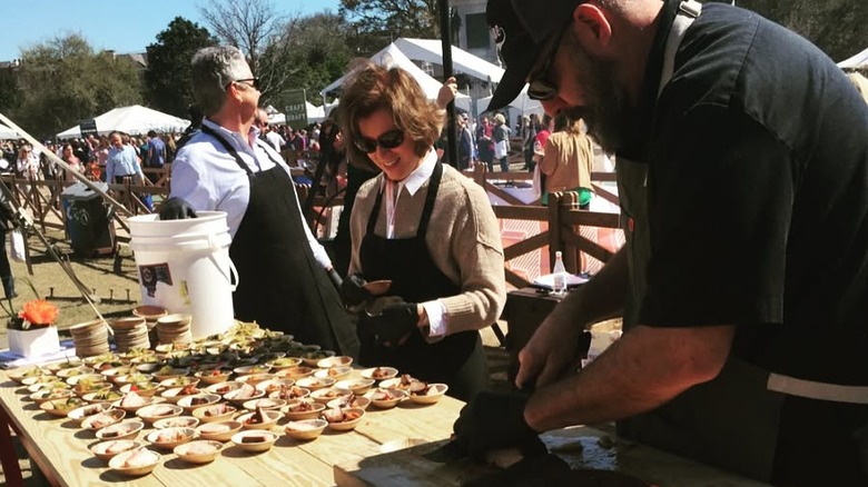 Chefs prepare dishes at Charleston Wine + Food