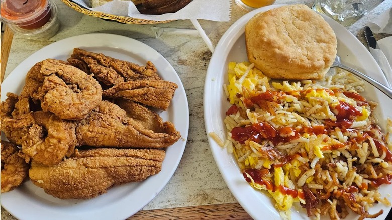 Southern comfort food, included eggs, hashbrowns, and biscuits smothered in gravy from Sunflower Family Restaurant in Charlotte