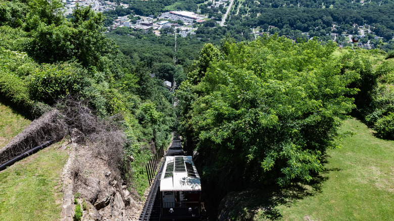 The overlook of Point Park with a canon in the foreground, and a river and city int he background