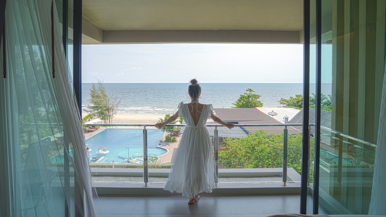 Woman with dress on balcony