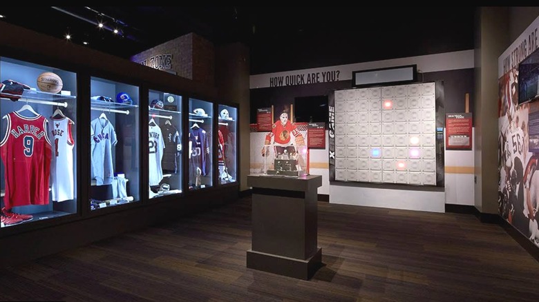 The interior of the Chicago Sports Museum with jerseys in the display cases