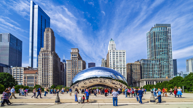 A view of the The Bean in Chicago with skyscrapers behind it