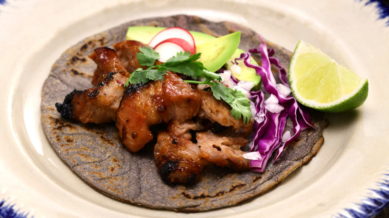 Blue corn tortilla fresh taco al pastor