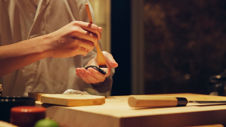 Chef preparing sushi