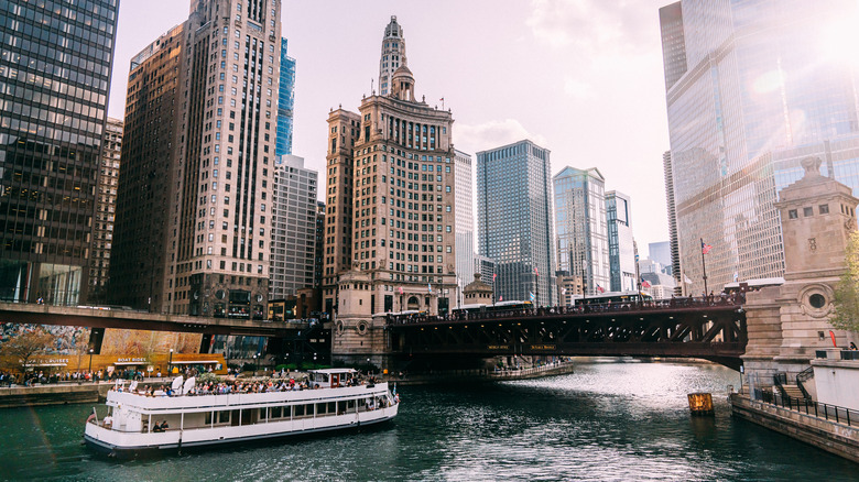 Aerial view of an architecture tour boat on the river in Chicago
