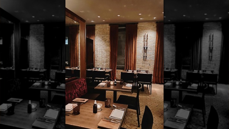 A picture of Michelin star restaurant Sepia's moody dining room in Chicago