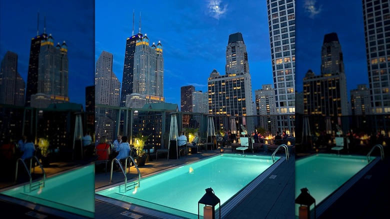 Lit-up rooftop pool at Viceroy Chicago during sundown