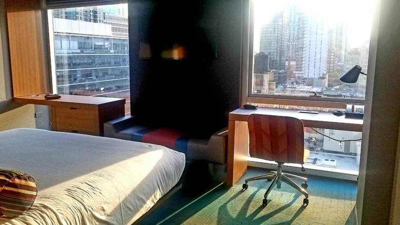 One of Aloft River North's rooms looking out into the city