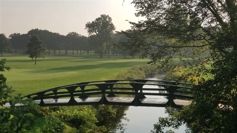 Bridge over body of water at golf course at Flossmoor Golf Club
