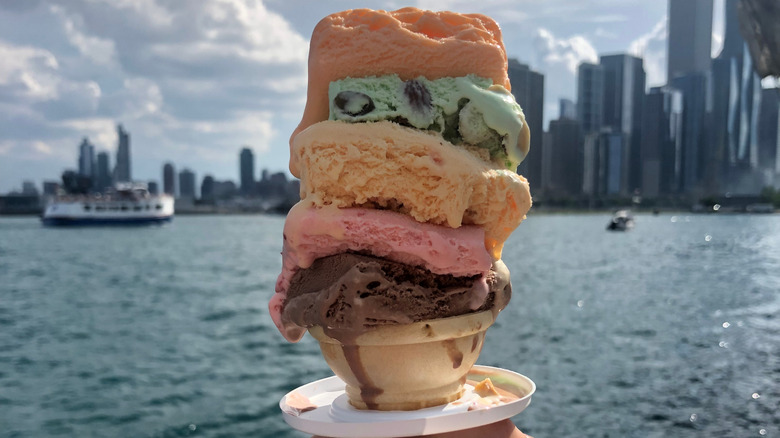 An ice cream cone in front of Chicago's skyline on the water