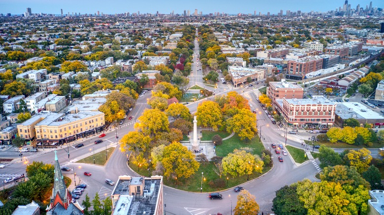 Aerial of Logan Square, centering on the roundabout around the Illinois Centennial Monument