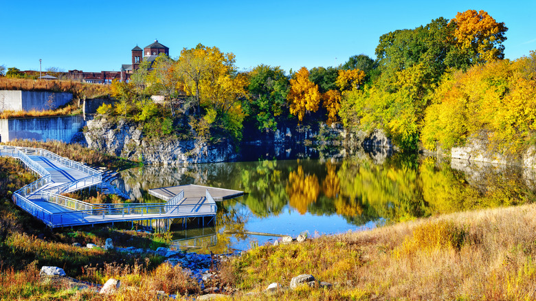 The Palmisano Park fishing pond and pier in autumn on a sunny day