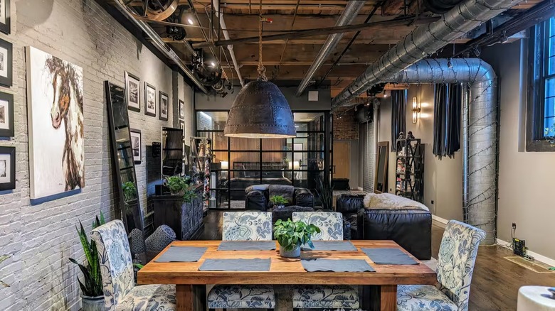 Interior of the exposed brick industrial main room of the Tea Studio Airbnb in Wicker Park, Chicago