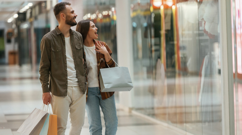 A man and woman shopping