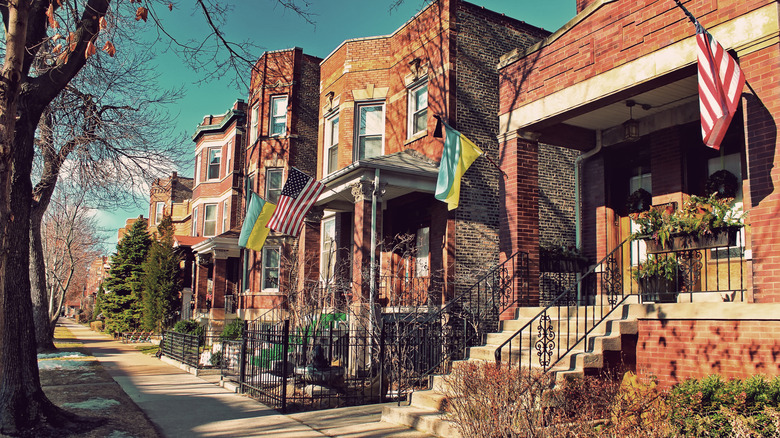 Row houses in Chicago's Ukrainian Village with Ukrainian and American flags