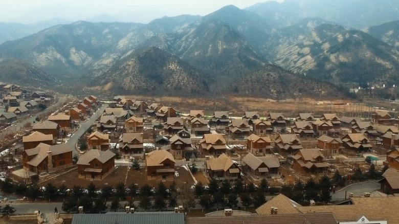 Homes in Jackson Hole, China, with mountains in the background