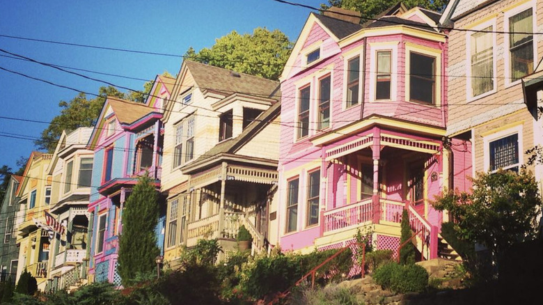 A row of colorful Victorian homes in Cincinnati's Columbia-Tusculum neighborhood