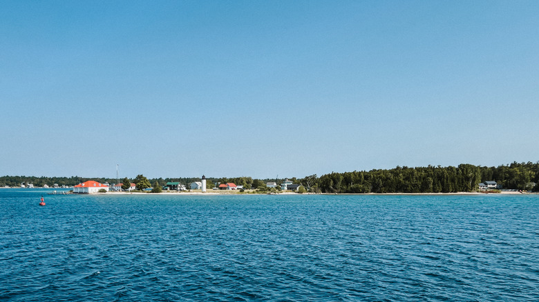 A distant picture of the Whisky Point Lighthouse in St. James Bay on Beaver Island